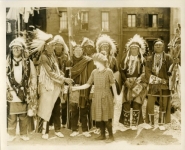Mary Pickford meets Sioux tribe leaders on the set of Little Annie Rooney - 1925 