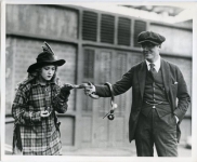 Mary Pickford with Marshall Neilan and snake on the set of M'Liss - 1918