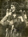 Mary Pickford with puppies, photo by K.O. Rahmn - 1925