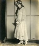 Mary Pickford with flowers, portrait by Peyton - 1916