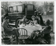 Jack and Mary Pickford with director Al Green on the set of Through the Back Door - 1921