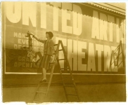Mary Pickford at a billboard announcing the grand opening of the United Artists Theatre in downtown Los Angeles - 1927 
