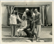 L to R: Al Jolson, Douglas Fairbanks, Mary Pickford, Ronald Colman, Sam Goldwyn and Eddie Cantor, sitting - 1932 