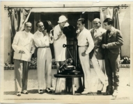 L to R: Al Jolson, Douglas Fairbanks, Mary Pickford, Ronald Colman, Sam Goldwyn and Eddie Cantor, sitting - 1932