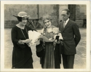 Douglas Donaldson, leader of the Southern California Arts and Crafts Movement, awards Mary Pickford a prize on the set of Rosita - 1923 