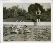 Mary Pickford and Douglas Fairbanks at a Pickfair pool party - 1922 (ca.)