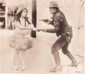 rb515 - William S. Hart pointing a gun at Mary, The Little Princess 1917