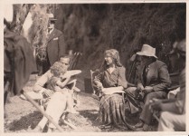 rb590 - Man sits with baby on lap with Mary & staff, Sparrows 1926