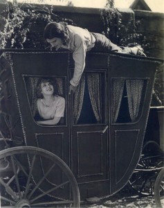 Mary Pickford and Douglas Fairbanks playing around at their studio