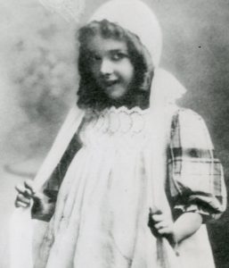 Mary on stage as a child